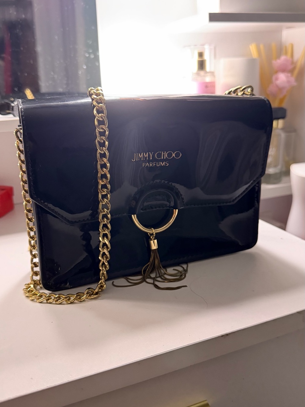 Jimmy Choo Black Patent Leather Crossbody with Gold Chain & Ring Tassel